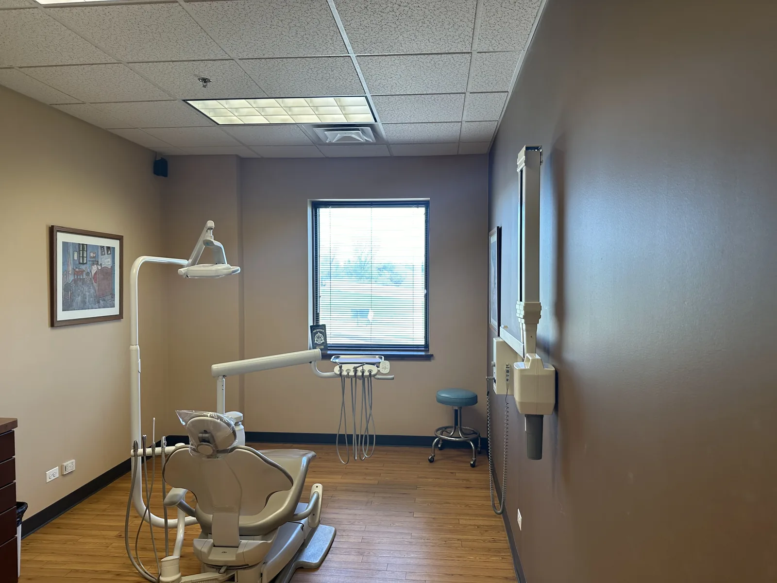 Repainted dental operatory in a warm gray