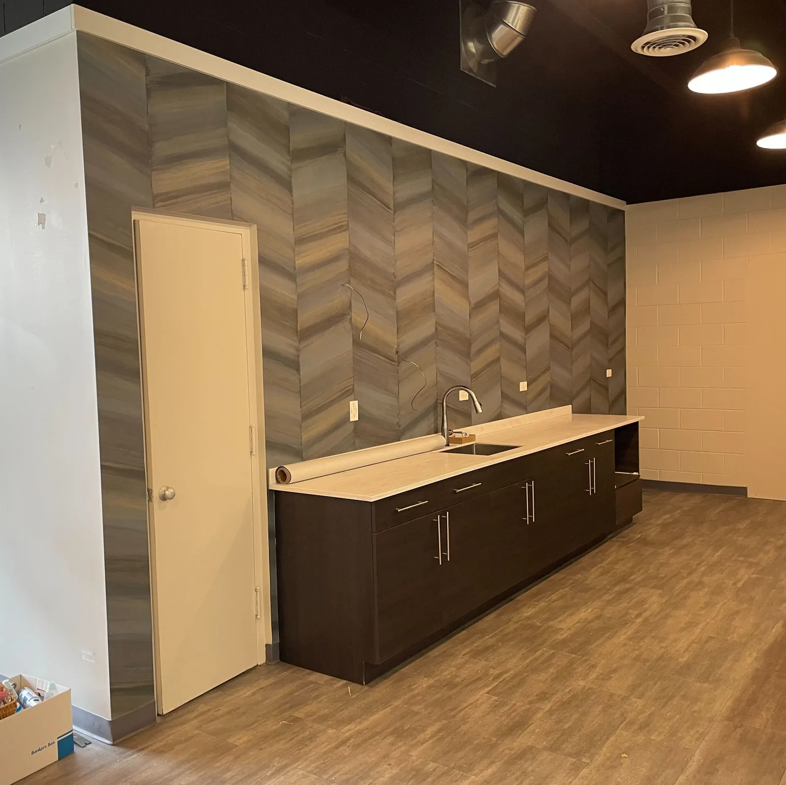Chevron wallcovering on an office break room wall