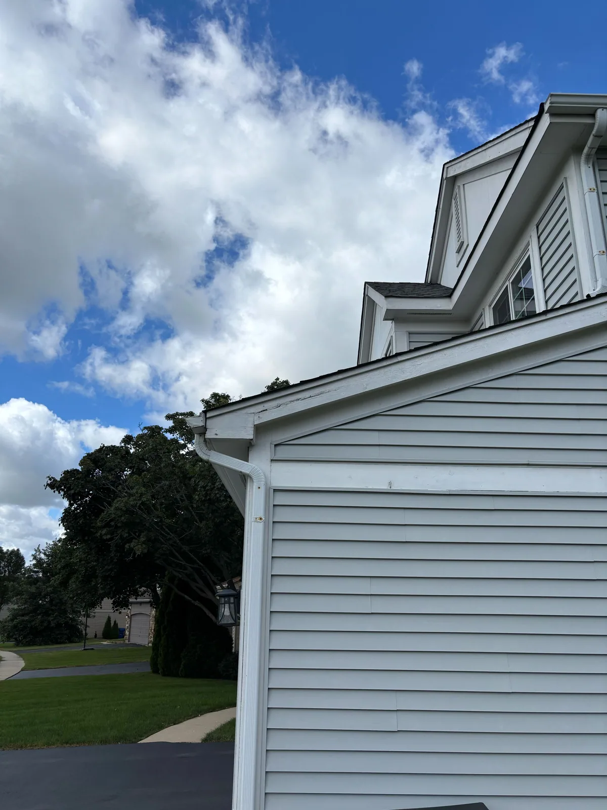 Repainted siding and gable on a two story home