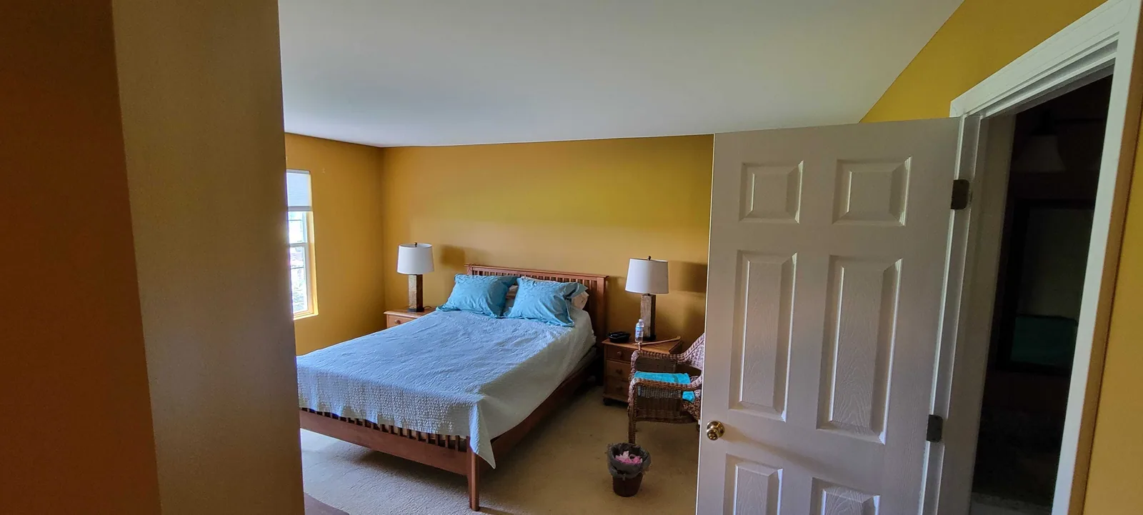 Bedroom painted in a warm gold