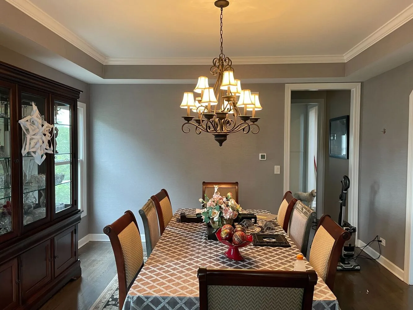Dining room with a tray ceiling repainted in gray