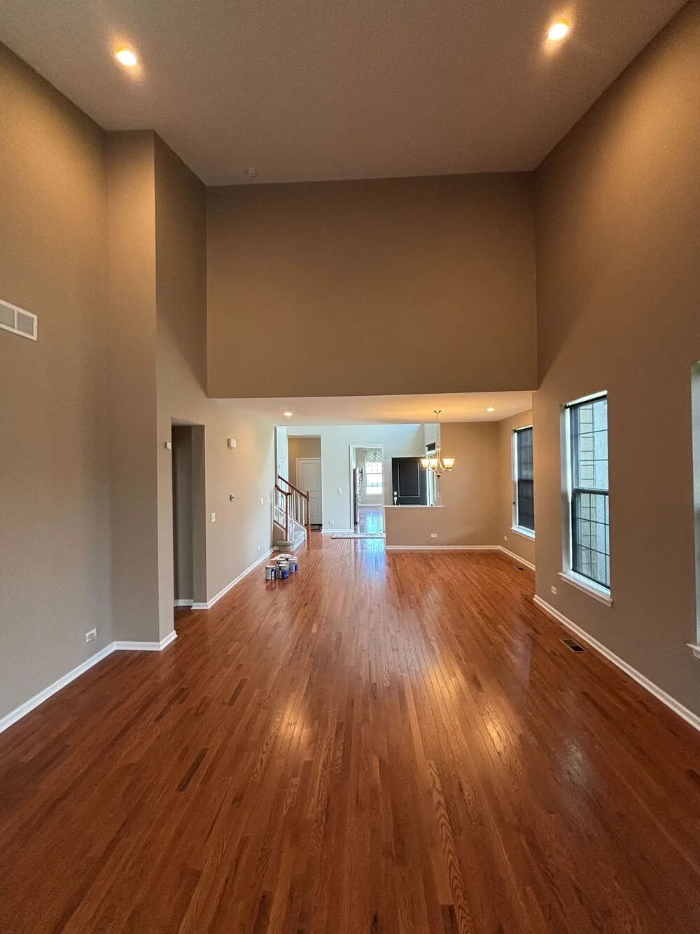 Open living area repainted in a warm neutral