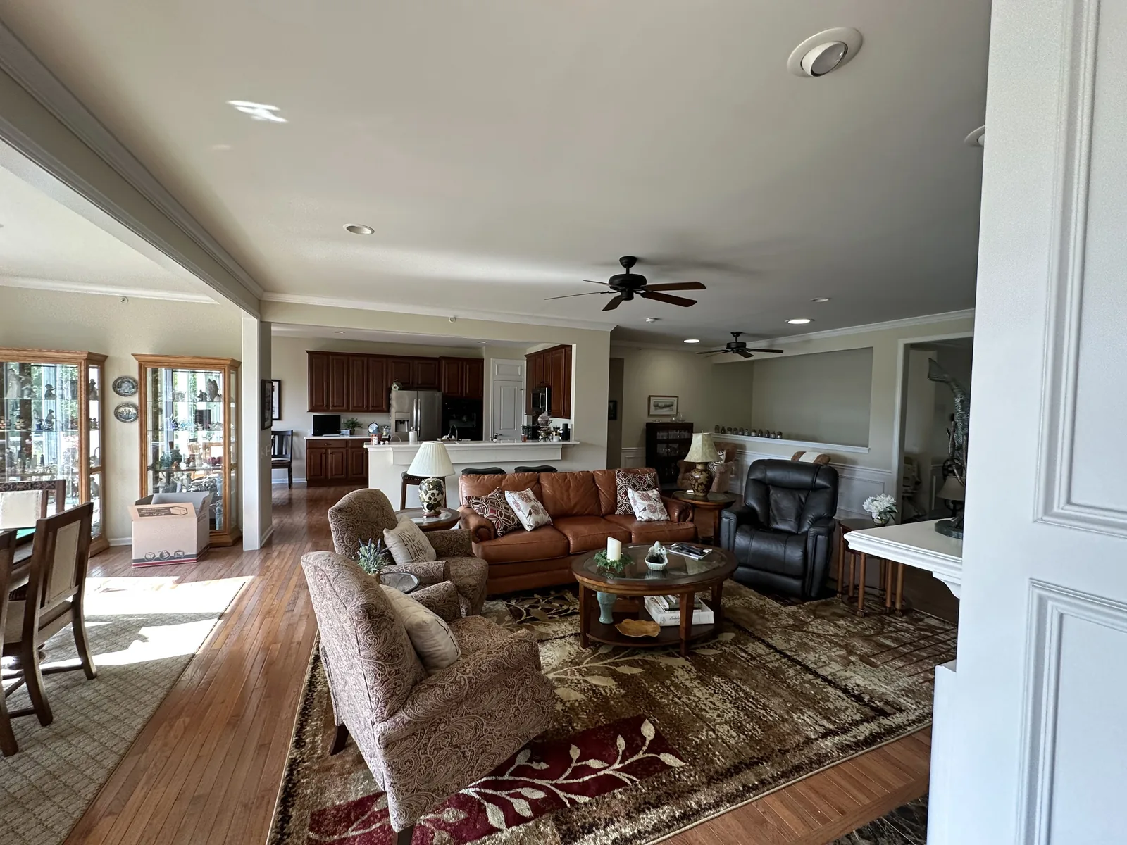Open family room and kitchen repainted in a soft neutral