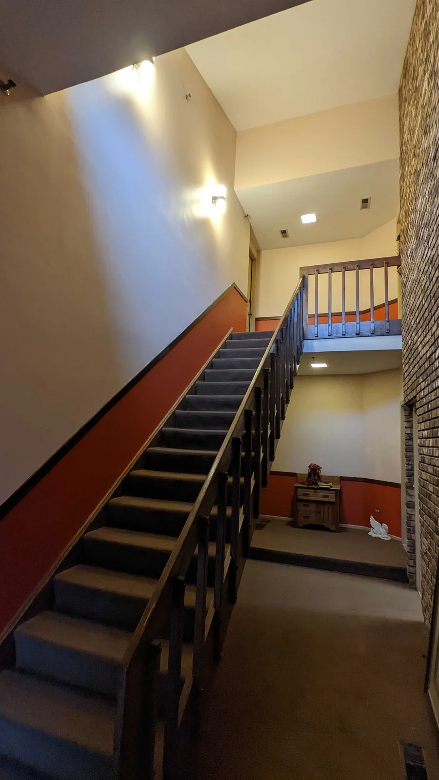 Stairwell repainted after wallpaper removal