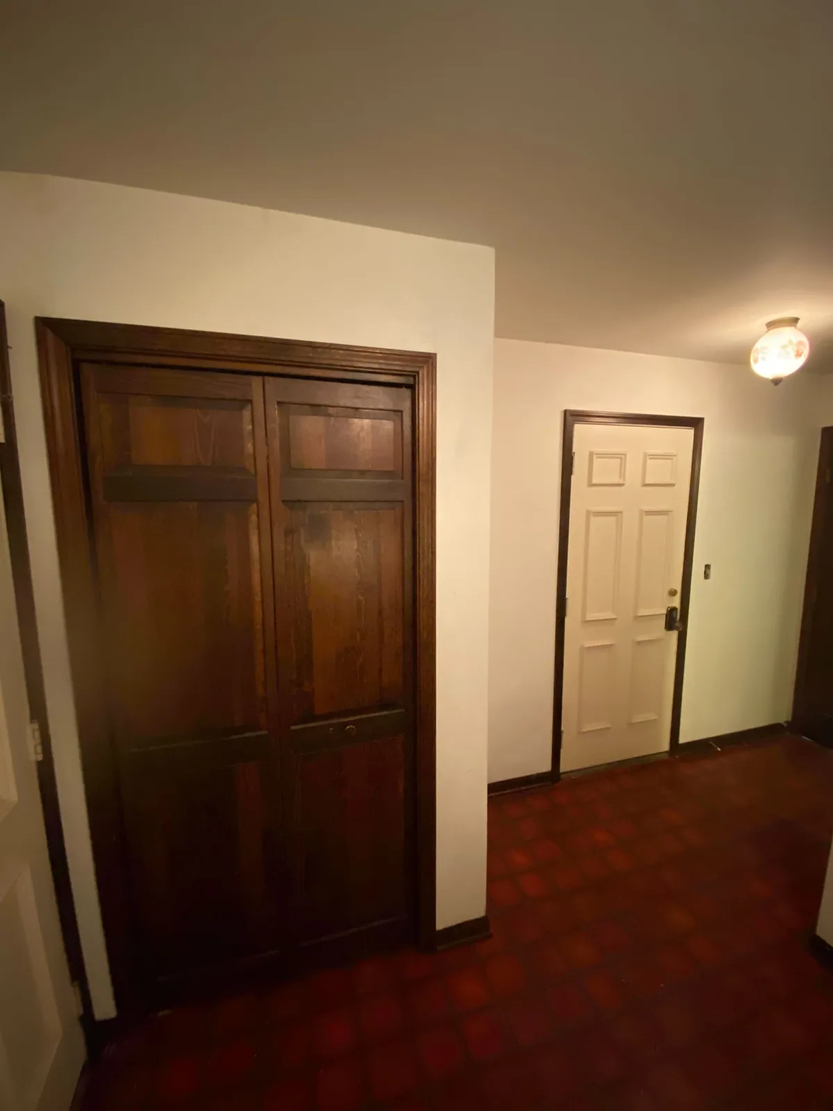 Hallway and doors repainted after wallpaper removal