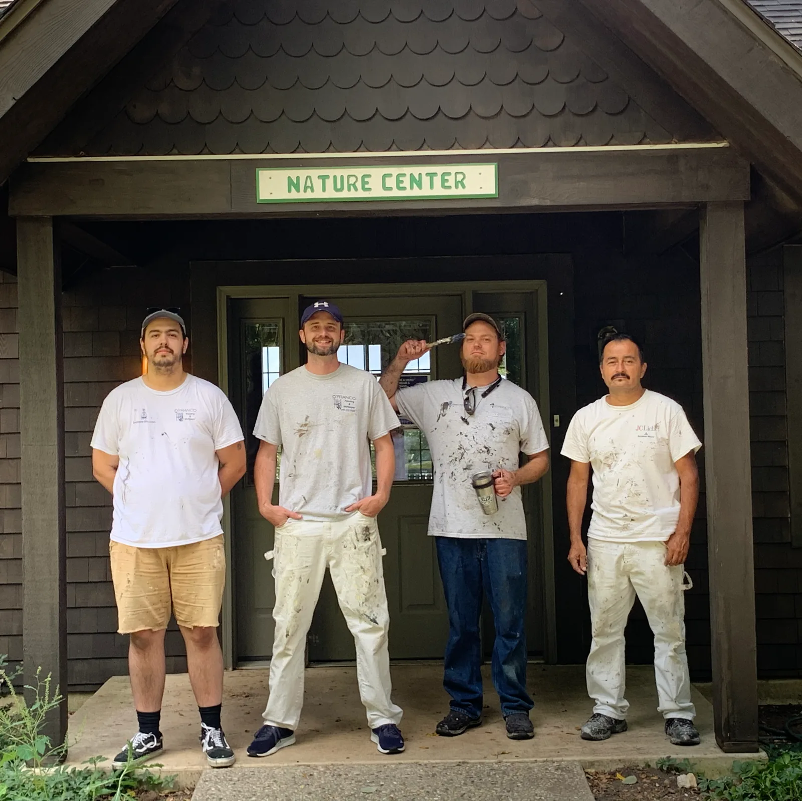 Four D'Franco painters at the Nature Center entrance